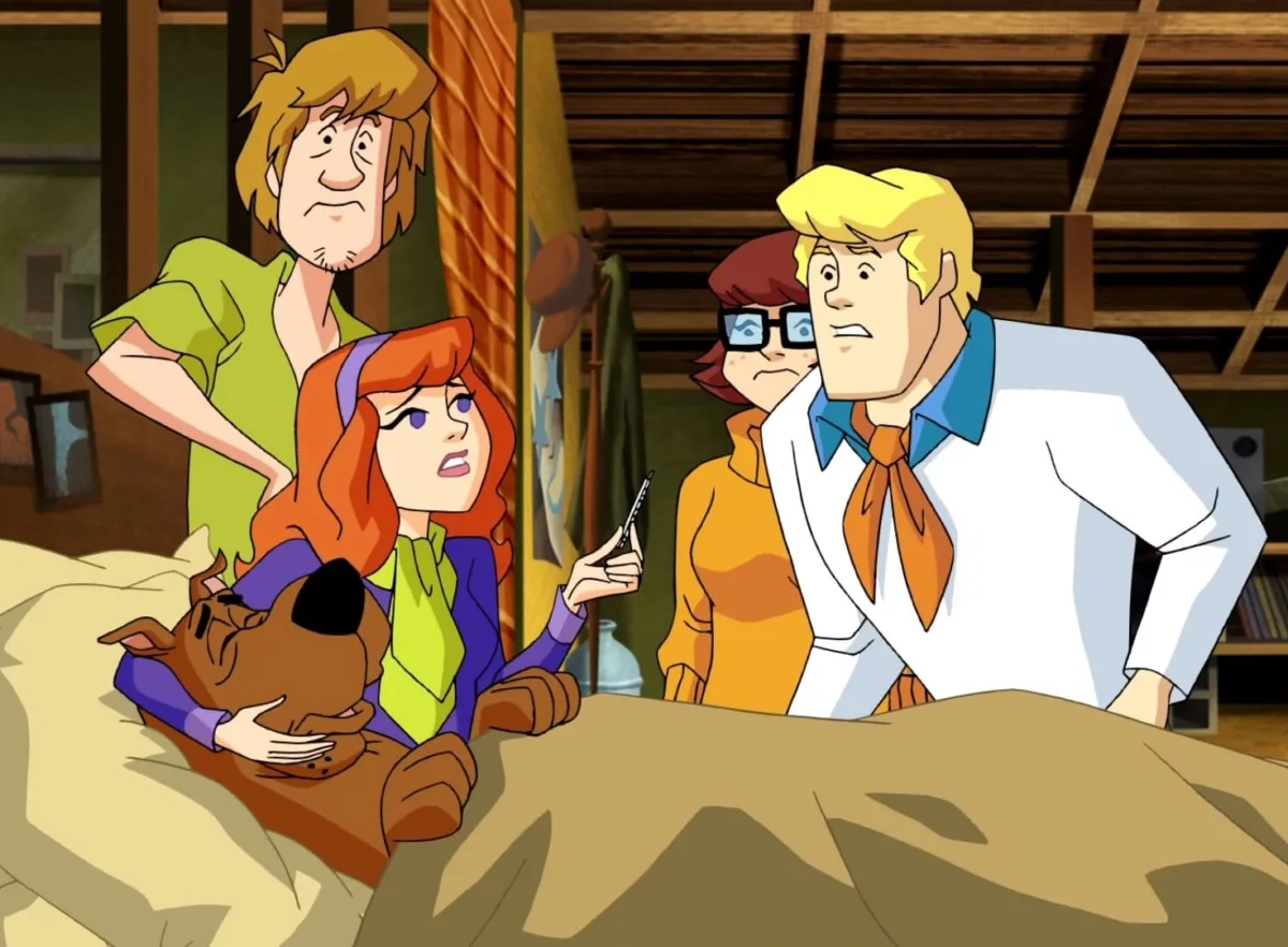 An image of Scooby-Doo lying in bed sick.