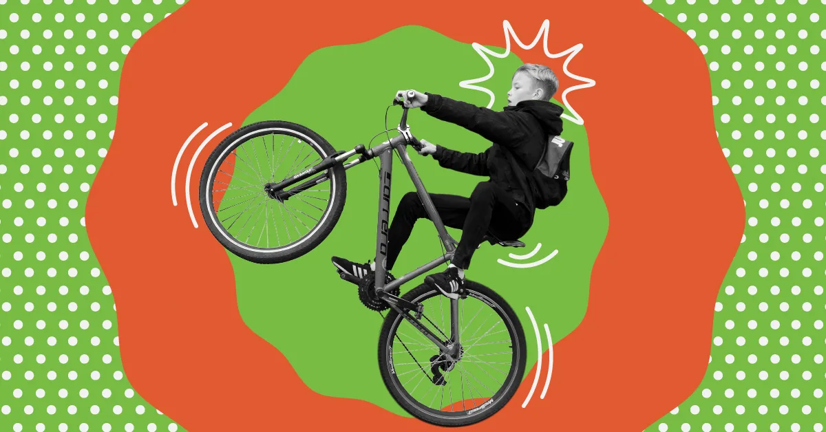 A future vybe urgent care child patient in Philadelphia popping a wheelie on a bike.